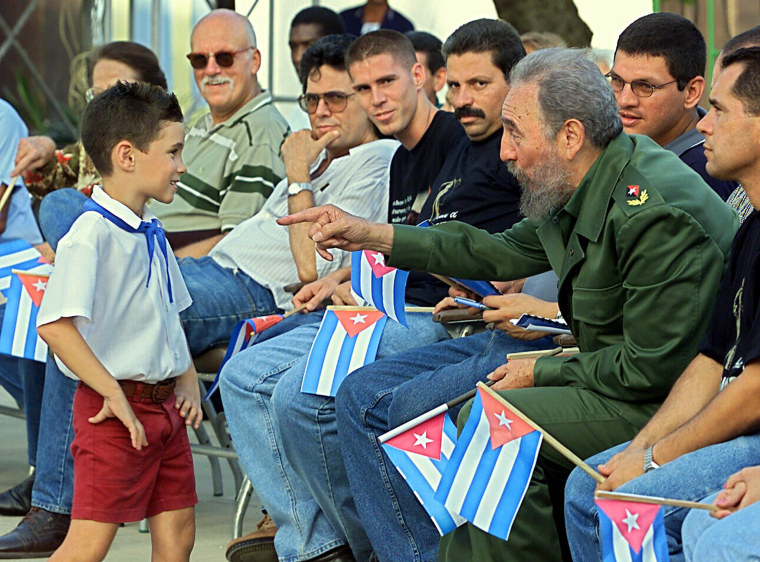 Cuban president Fidel Castro (2nd R) tal